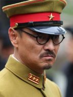 武田弘一（尹鑄勝飾演）