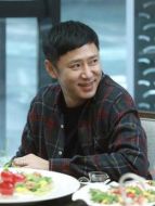 蘇明哲（高鑫飾演）
